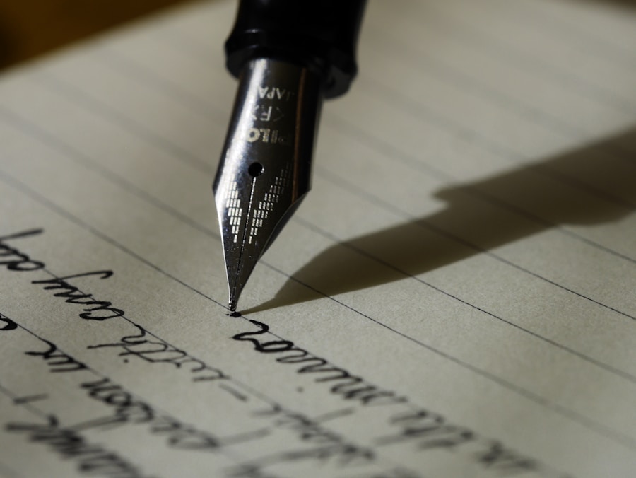 Fountain pen writing on lined paper, with handwritten text and a cast shadow visible
